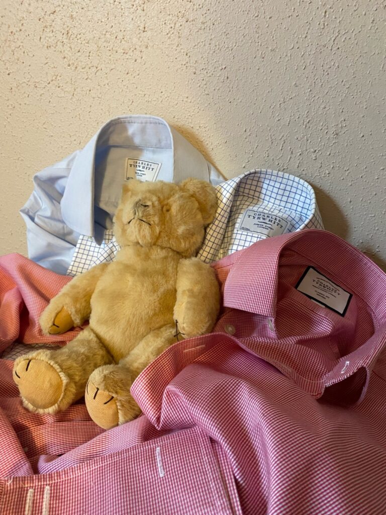 Three Charles Tywrhitt shirts in pink and white and a teddy bear